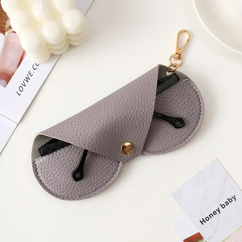 Litchi นูนแว่นตาน่ารักแขวน PU  - Travel Reading Accessories บทวิจารณ์และราคา